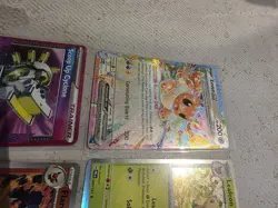 Prismatic Evolutions Eevee / Leafeon 4 Card Bundle With Tin - Image 2