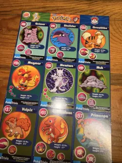 POKEMON 1ST MOVIE CARDS 1999 BURGER KING #20 MASTER TRAINER SET UNCUT Sheet - Image 1