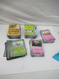Bundle of Pokemon Cards in Collectable Tin - VGC S&V Era - Image 2