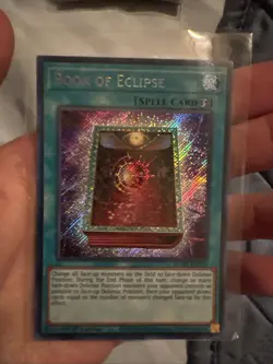 YuGiOh Book of Eclipse Secret Rare 1st Edition BLMR-EN090 - Image 1