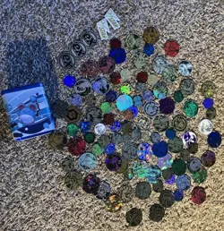 Pokemon card Trading game Coin Lot 60+ Coins Assorted + TIN - Image 1
