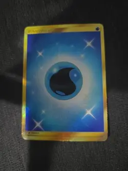 Water Energy (Secret) 124/111 Sm-Crimson Invasion Holo Pokemon - Image 1