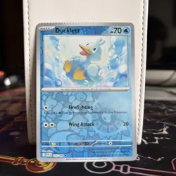 Ducklett 025/086 Reverse Holo CRIMP Error White Flare Pokemon Card - Image 1