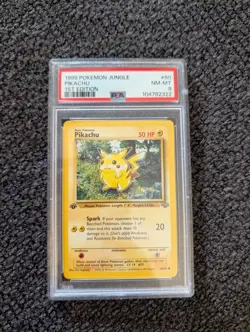 1999 Pokemon 1ST Edition JUNGLE PIKACHU PSA 8 NM-MT 60/64 - Image 1