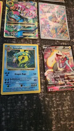 Pokemon 12 Card Lot. Evolutions Charizard, Shadowless Gyarados, Ash's Pikachu. - Image 5