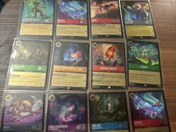 Lot Of 12 Common And Uncommon Foil Lorcana Cards - Image 1