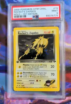 PSA 9 2000 POKEMON GYM CHALLENGE ROCKET'S ZAPDOS HOLO-1ST EDITION #15 - Image 1