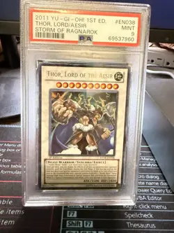 2011 YU-GI-OH! STOR-STORM OF RAGNAROK #EN038 THOR, LORD OF THE AESIR PSA 9 - Image 1