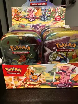 Pokemon Prismatic Evolutions Mini Tin Display Box - Full Set - 8 tins - Image 1