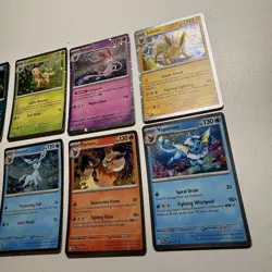 Pokemon TCG Prismatic Evolutions Costco Mini Tin Cosmos Promo Cards Set Of 8 NM - Image 2