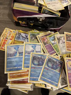 TIN OF MIXED HOLO, REVERSE HOLO AND ASSORTED POKEMON CARDS - Image 2