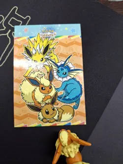 Eevee Evolutions - Star Holo - Let's Go Eevee Database - Pokemon Card - Image 1