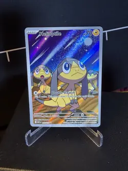 Helioptile 143/132 Me01: Mega Evolution Holo Pokemon Card NM Condition - Image 1