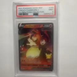2021 POKEMON SWSH BLACK STAR PROMO CELEBRATIONS COLL LANCE'S CHARIZARD V PSA 9 - Image 1