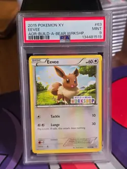 PSA 9 MINT Eevee 63/98 Build A Bear Exclusive Stamped Promo Pokemon TCG 2015 - Image 1