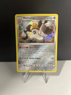 Melmetal 129/214 Reverse Holo Unbroken Bonds Pokemon 2019 - Image 1