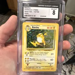 1999 POKEMON BASE SET #14 RAICHU-HOLO CGC 8 NM-M - Image 1