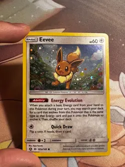 Pokemon Eevee 101a/149 Sun & Moon Cosmos Holo Rare SWIRL Near Mint - Image 1