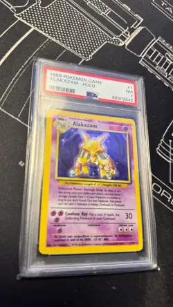 1999 POKEMON GAME #1 ALAKAZAM-HOLO PSA 7 - Image 3