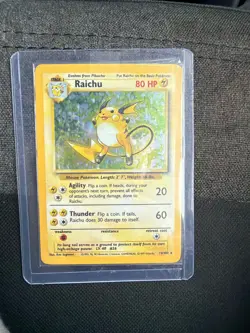 Pokemon TCG Raichu Base Set 14/102 Holo 1999-2000 Wizards Base Set Copyright... - Image 1