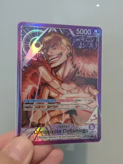 One Piece TCG English OP14-060 Donquixote Doflamingo Leader Alt Art Parallel - Image 1