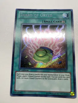 Yugioh Shard Of Greed 1st Edition Secret Rare PHSW-EN057 HP - Image 1