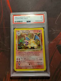 1999 POKEMON BASE SET UNLIMITED #4 CHARIZARD-HOLO PSA 3 - Image 1