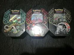 Pokemon TCG Paldean Fates Tins Set of 3 Sealed - Image 1