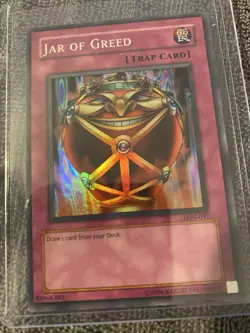 Konami Yugioh Jar of Greed Trap Labyrinth of Nightmare LON-047 Super Rare - Image 1