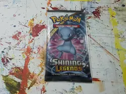 Pokemon TCG 2017 Shining Legends Booster Pack Mew Art w/ Protective Sleeve - Image 1