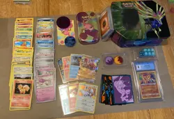 Pokemon card lot, tins and more, no duplicates, includes holos and a graded slab - Image 1