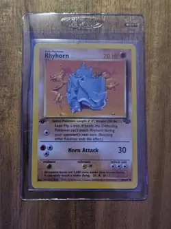 Rhyhorn 1st Edition - #61/64 - Jungle Set 1999 - Pokemon Card - Excellent+ - Image 1