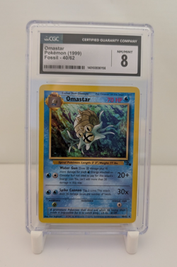 1999 Fossil Unlimited Omastar 40/62 Pokemon Card CGC 8 | Vintage Rare Fossil - Image 1