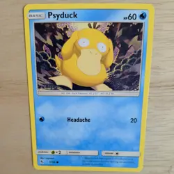PSYDUCK 11/68 POKEMON CARD (HIDDEN FATES SET) - Image 1