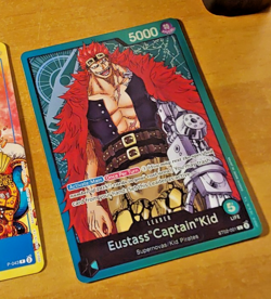 ONE PIECE ENGLISH CARTE GAME CARTE HOLO KID ST02-001 EN NM - Image 1