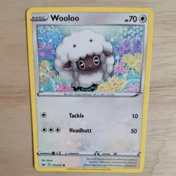 WOOLOO 153/202 POKEMON CARD (SWORD AND SHIELD SET) - Image 1