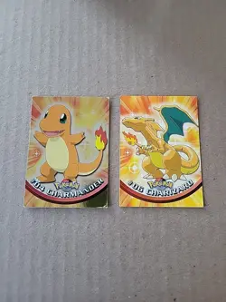 Reverse Holo Charmander And Regular Charizard Topps Blue Logo Pokemon Cards - Image 1