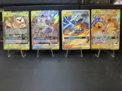 Lot of 4 TAG TEAM Pokemon Cards Blastoise Charizard Raichu Rowlet - Image 1
