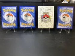 Lot of 4 TAG TEAM Pokemon Cards Blastoise Charizard Raichu Rowlet - Image 2