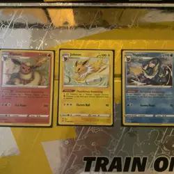 Flareon, Jolteon, and Vaporeon Pokemon TCG Sword and Shield Base Set Cosmo Holo - Image 1