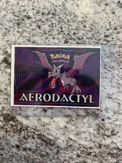 POKEMON--AERODACTYL--NEW--Vintage (1999) Vending Machine Sticker (#405) - Image 1
