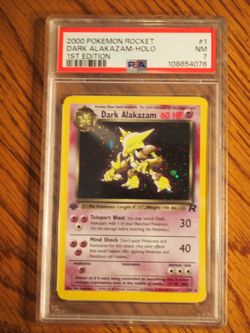 Pokemon 2000 1st Edition Team Rocket Dark Alakazam rare foil card PSA 7 - Image 1