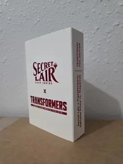 MTG Secret Lair ~ Transformers: Optimus Prime vs Megatron-Sealed Cards - Image 1