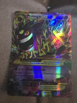 It is a Mega Evolution Pokemon EX card with 220 HP. The card number is... - Image 1