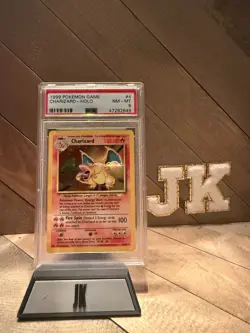 1999 Pokemon Game Charizard Holo #4 PSA NM-MT 8 - Image 1