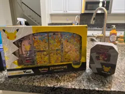 Pokemon TCG Celebrations Pikachu V Union Box / Lance Charizard Tin - Image 1
