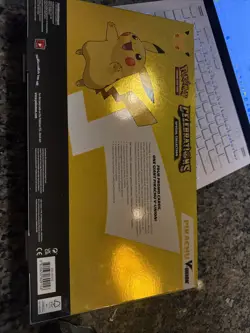 Pokemon TCG Celebrations Pikachu V Union Box / Lance Charizard Tin - Image 4