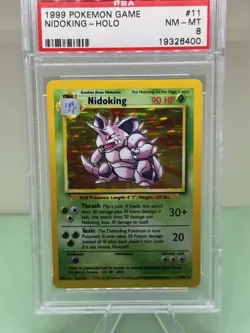 1999 POKEMON BASE SET UNLIMITED #11 NIDOKING-HOLO PSA 8 - Image 1