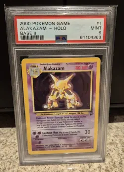 Base Set 2 Alakazam Holo (PSA 9) 1/130 Pokemon Card WOTC 1999 - Image 1