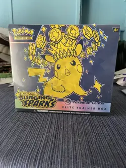 Pokemon Surging Sparks ETB Pokemon Center Exclusive Edition New Factory Sealed - Image 1